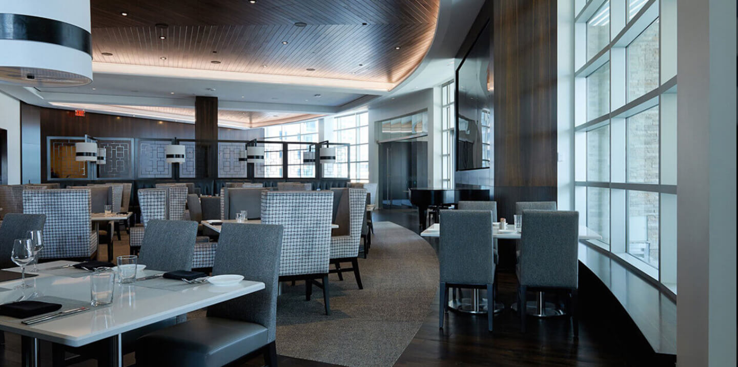 Dining interiors at III by Wolfgang Puck in Houston, TX